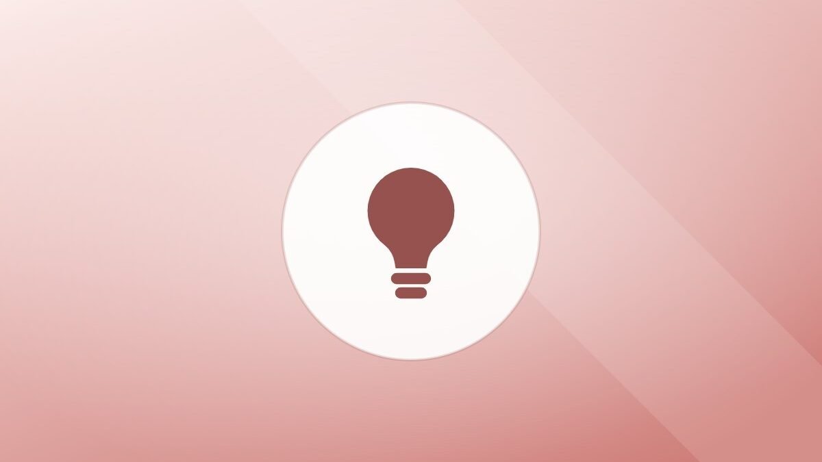 Illustration of a lightbulb on a warm background