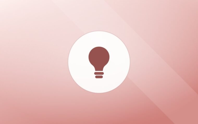 Illustration of a lightbulb on a warm background