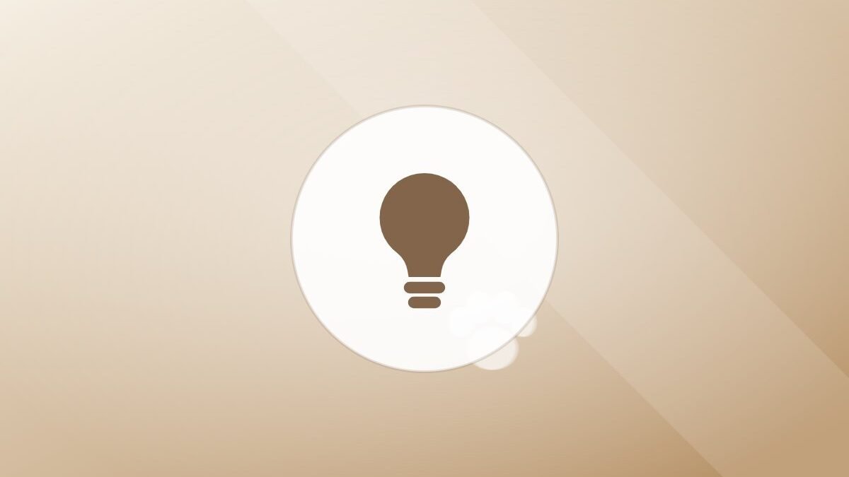 Illustration of a lightbulb on a warm background