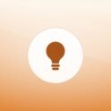 Illustration of a lightbulb on a warm background