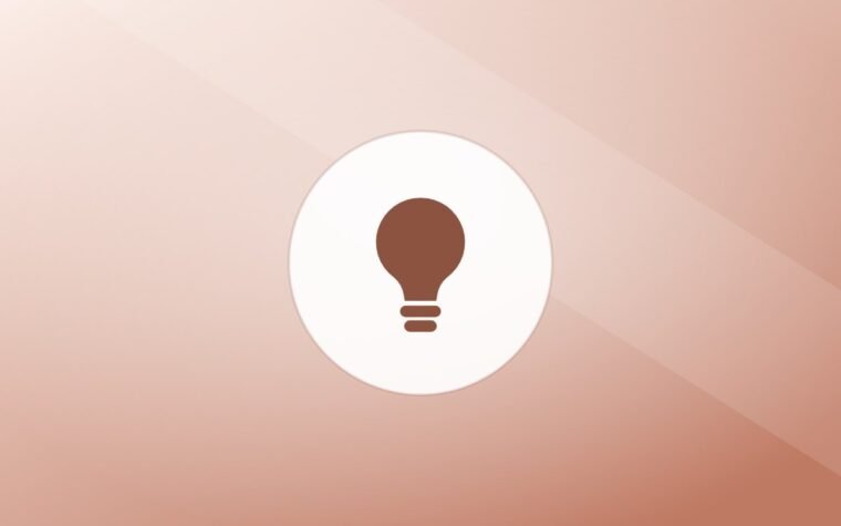 Illustration of a lightbulb on a warm background