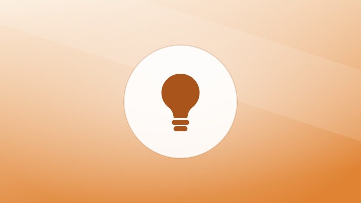 Illustration of a lightbulb on a warm background