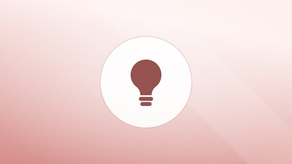 Illustration of a lightbulb on a warm background