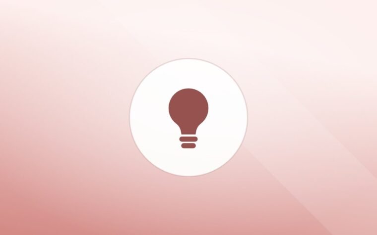 Illustration of a lightbulb on a warm background