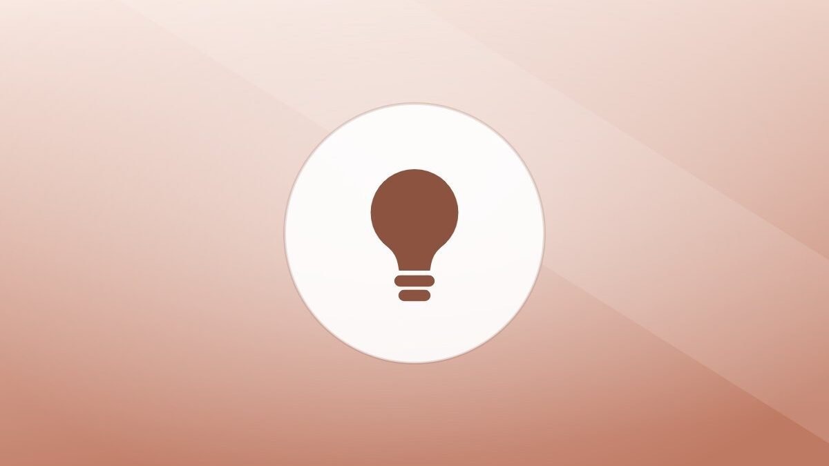 Illustration of a lightbulb on a warm background