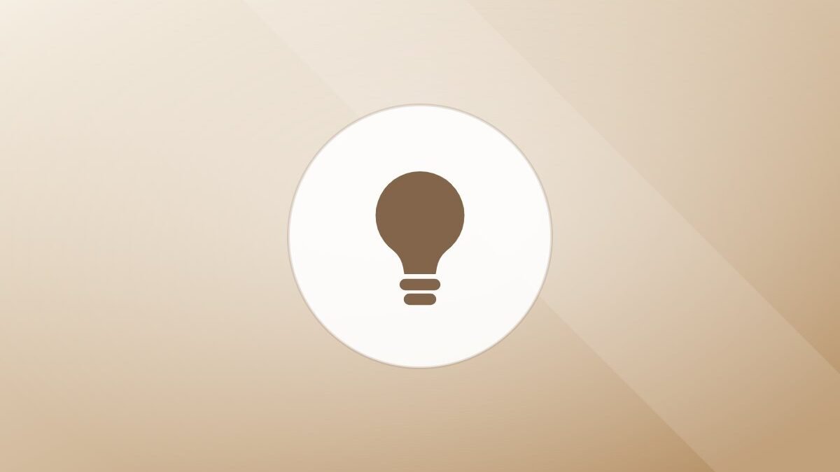 Illustration of a lightbulb on a warm background